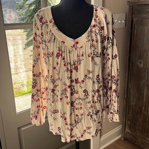 Multicolor including beige background with pink and gold flowers. Black dots.